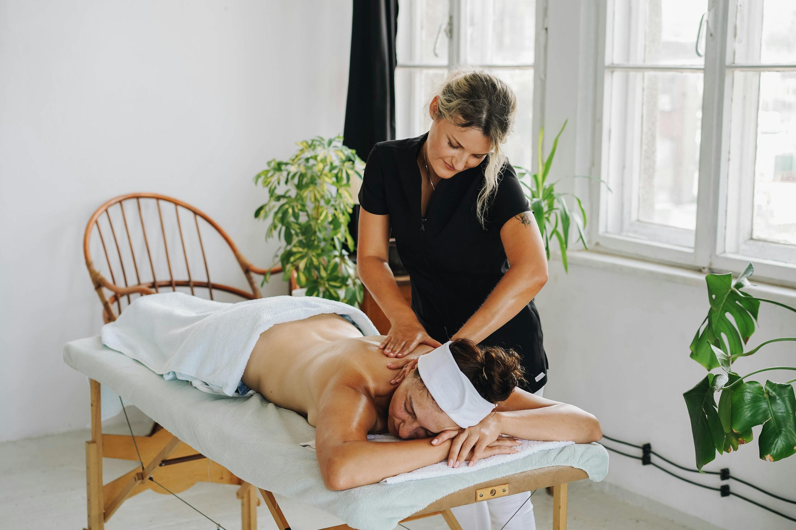 A soothing indoor massage session promoting relaxation and well-being.